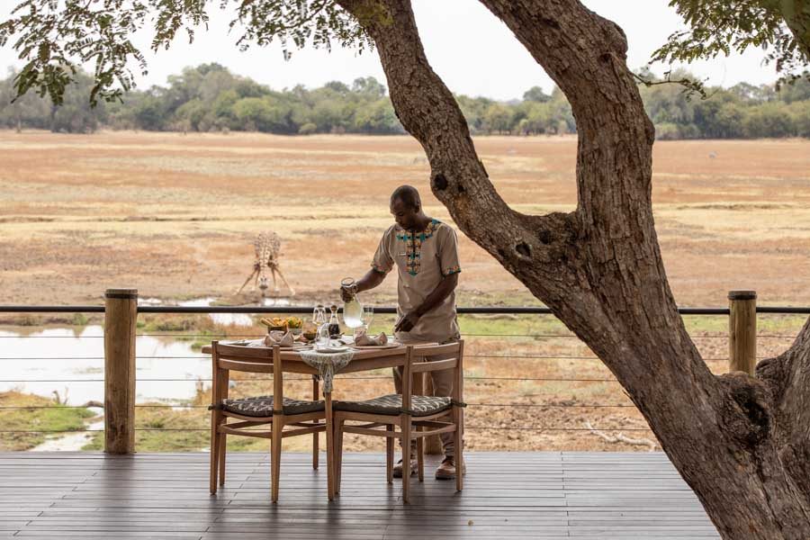 Breakfast laid on the deck above the Puku Ridge waterhole